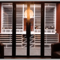 (1) Under normal lighting conditions, this is how this modern home wine cellar looks.